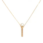 Perla’s gold magic wand necklace