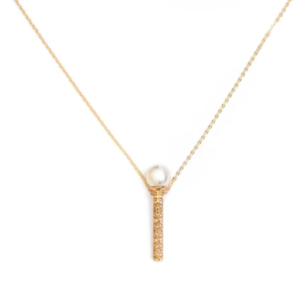 Perla’s gold magic wand necklace