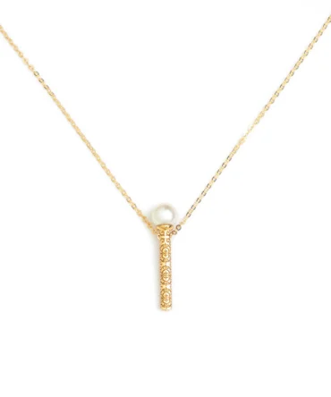 Perla’s gold magic wand necklace