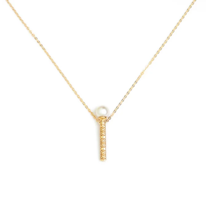 Perla’s gold magic wand necklace